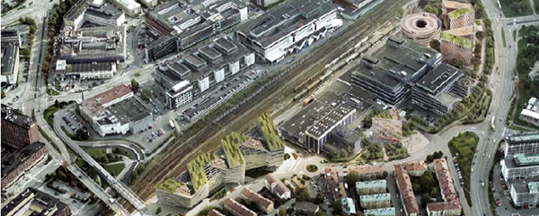 Den möjliga nyproduktionen syns i övre högra hörnet. Längst ner på bilden, vid spåren och på samma sida, syns Swedbanks nya huvudkontor. Fastigheten däremellan är känd som Stora Blå. 
